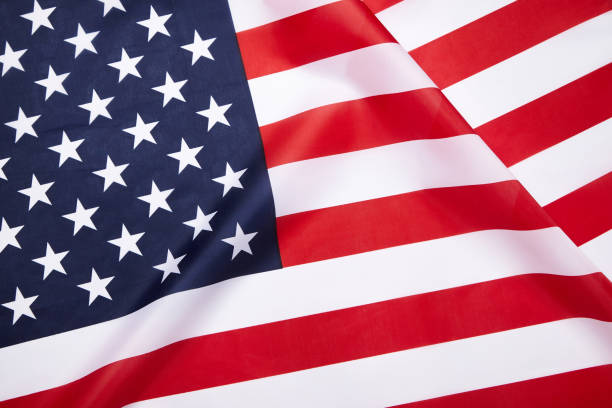 istock American flag background. Waving USA flag. 1159561794
