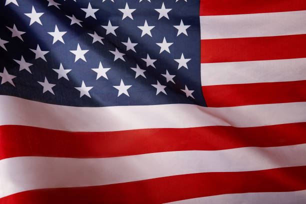 istock American flag background. Waving USA flag. 1159561825