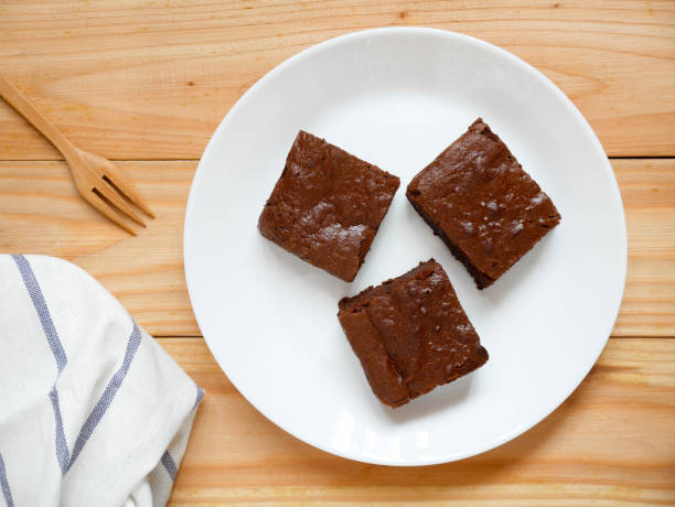 istock Homemade chocolate brownies on a white plate 1159565718