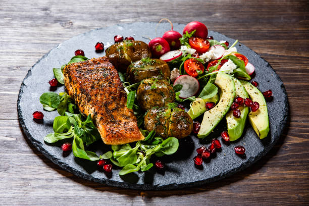 istock Roasted salmon and vegetables 1159565856