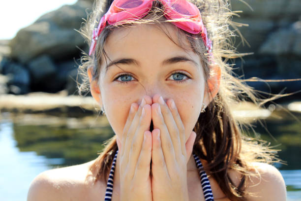 istock Happy girl on the beach 1159566249