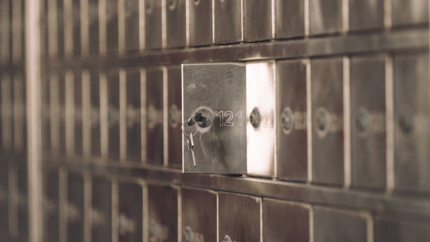 istock Close-up of a mailbox number 121 with a small key - post office box or PO BOX concept - private bank deposit box 1159568258