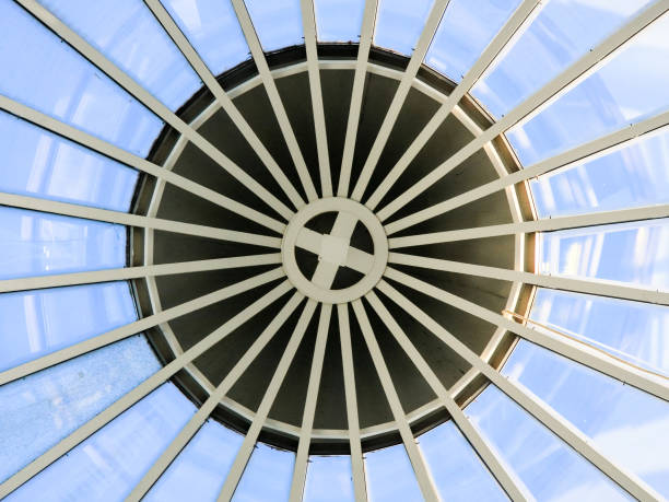istock Bottom view of the blue sky through a glass spherical dome 1159572244