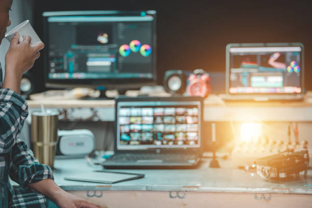 istock The content creator working in the studio house and relaxing with drinking coffee and enjoy with the video footage editing for uploading to the blog or internet 1159575215