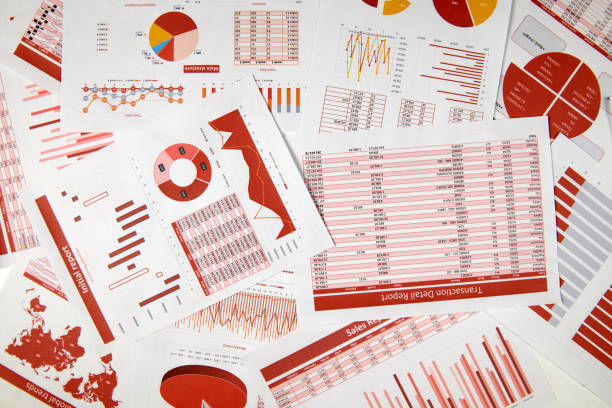 istock Flat top view of business workspace - reports with data, tables and analytic chart. Business financial accounting concept. 1159578499