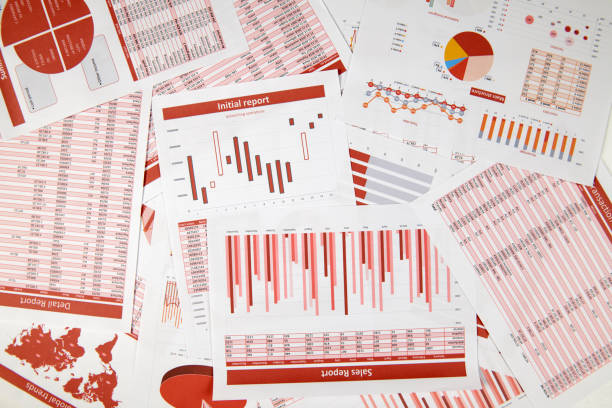 istock Flat top view of business workspace - reports with data, tables and analytic chart. Business financial accounting concept. 1159578554
