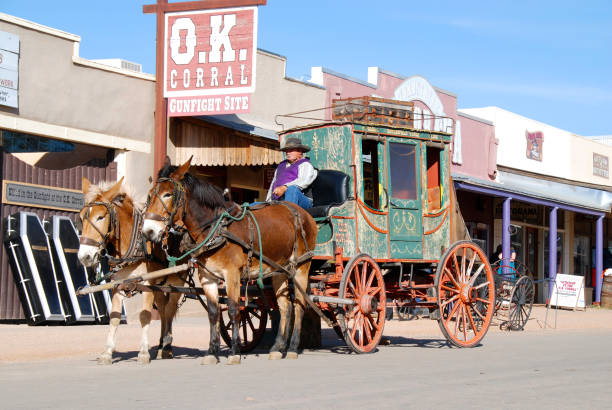 Tombstone Tombstone, Arizona, 04/06/2012
historic coach in front of O.K. Corral in western town of Tombstone corral stock pictures, royalty-free photos & images