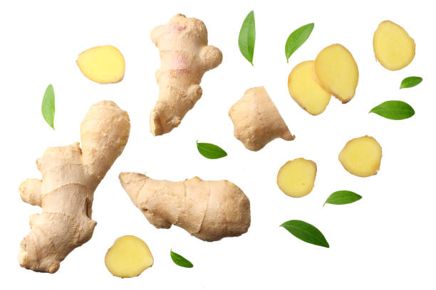 istock sliced ginger with leaves isolated on white background top view 1159580043