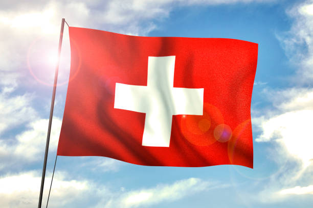 istock Swiss Flag Waving With Wind On Blue Sky 1159581063