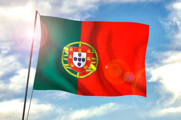 Portuguese Flag Waving With Wind On Blue Sky