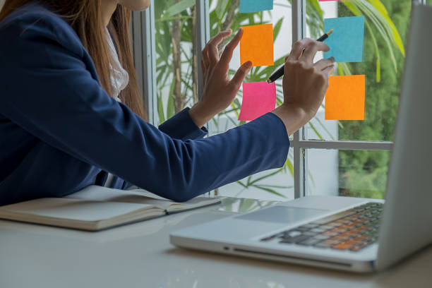 istock Business team brainstorming and discussing with financial data and report graph. Teamwork meeting working concept. 1159581891