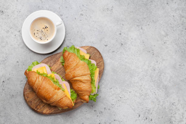 istock Coffee and croissant sandwich 1159582046