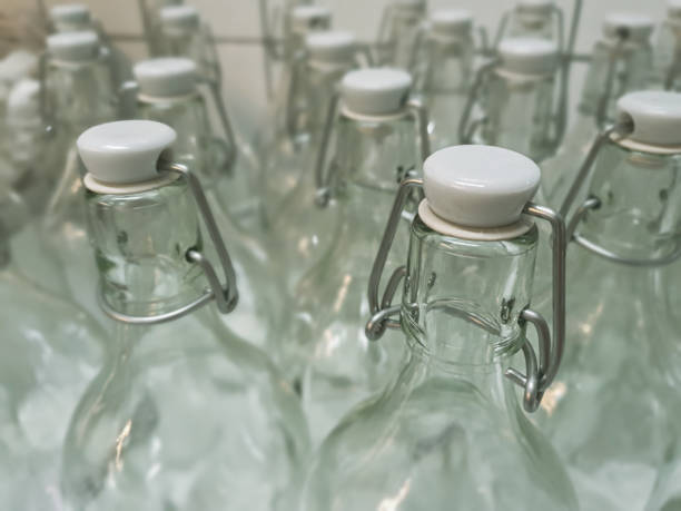 istock Retro bottle. Empty old glass bottles background 1159582960