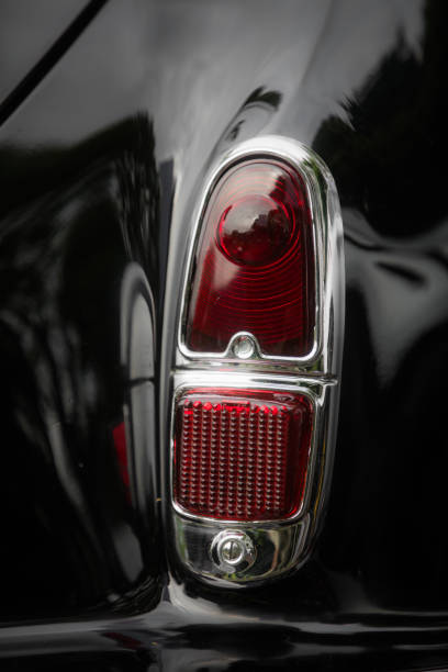 istock Red tail light of a classical vintage car 1159583277