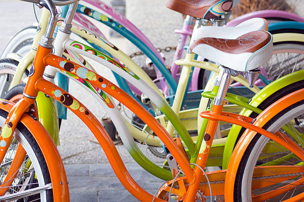 istock Row of colorful retro replica bikes. 115958480