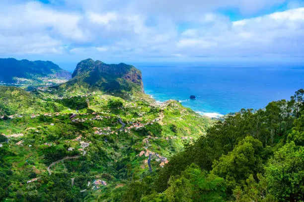 Landscape scenery from Portela Viewpoint - Porto da Cruz at beautiful coast and mountains in the north of Madeira island - Ribeira Frio-Portela, Portugal.