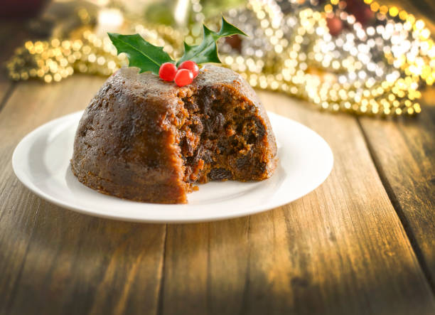 Christmas Pudding Christmas pudding on wood table top christmas pudding stock pictures, royalty-free photos & images