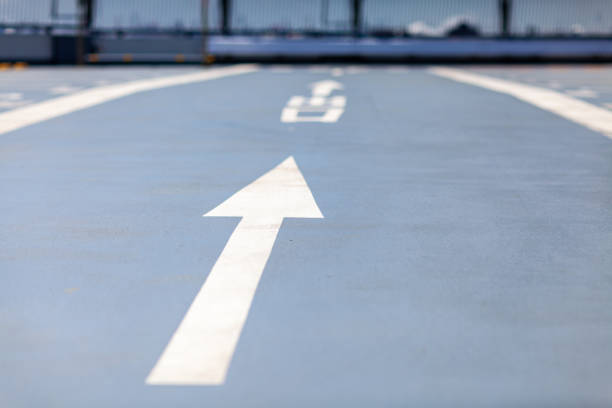 istock Road sign in the parking. 1159592960