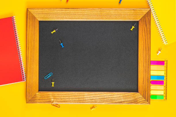 istock Chalkboard with stationery, flat lay 1159594400