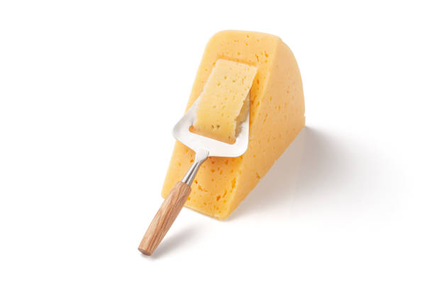 istock Dutch cheese with typical slicer isolated over white 1159594641