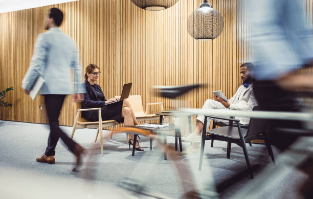 istock Business People Working in The Corridor 1159594710