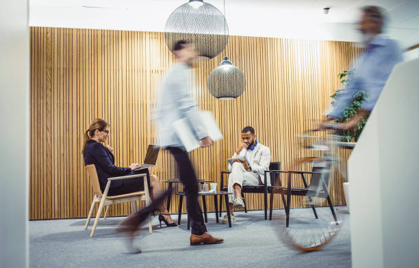 istock Business People Working in The Corridor 1159596260