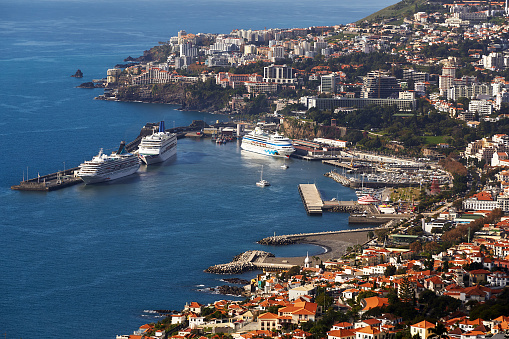 Funchal, Portugal - December 27, 208: City view of Funchal in winter shortly after Christmas. in the harbor are the big cruise ships.