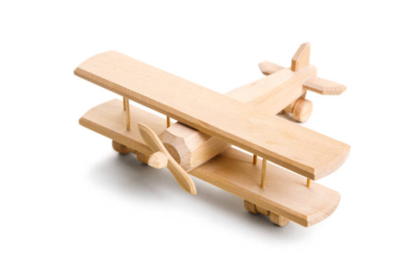 istock Retro wooden airplane isolated on white background 1159601212