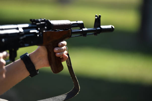 istock Outdoor target shooting with assault rifle in a shooting range 1159601262