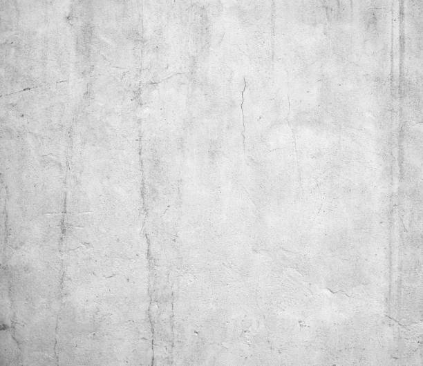 istock Gray painted concrete old cracked wall texture background 1159601335