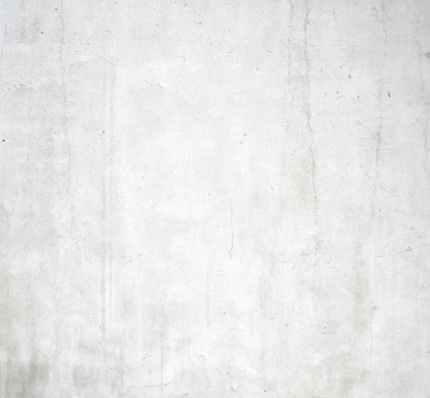 istock Gray painted concrete old cracked wall texture background 1159601374