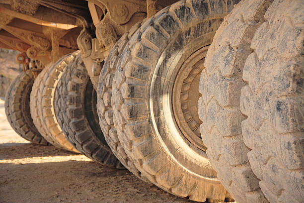 Vehicle tracks in fine golden sand
