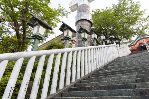 Fukuoka, Japan - May 2, 2019 : A stone marble step staircase and railing at Daihonzan Naritasan Kurume Temple.