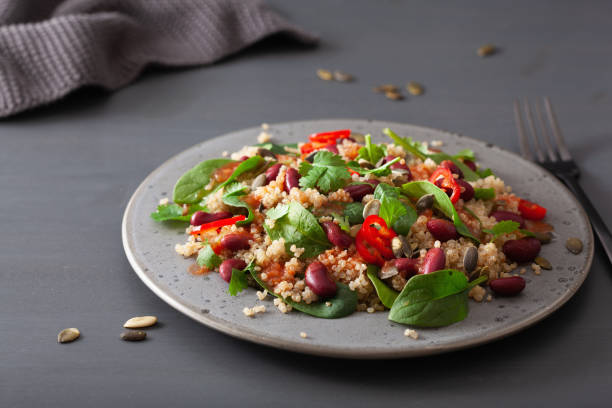 istock healthy bean and quinoa salad with spinach, chili 1159609849