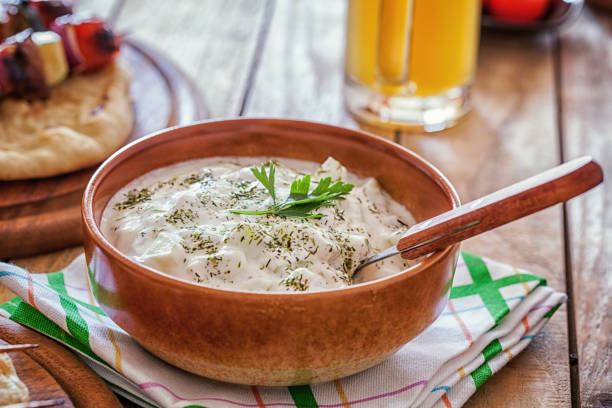 Tzatziki, greek salad with cucumber,garlic, dill and yogurt Tzatziki greek salad in bowl, close-up tzatziki stock pictures, royalty-free photos & images