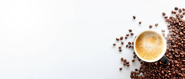 hot espresso and coffee bean on white table with soft-focus and over light in the background. top view - coffee cup coffee cup coffee bean imagens e fotografias de stock