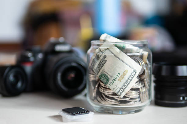 зарабатывать деньги от фотографии работу - making money фотографии стоковые фото и изображения