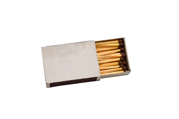 istock Wooden matches and matchbox isolated on white background 1159616734
