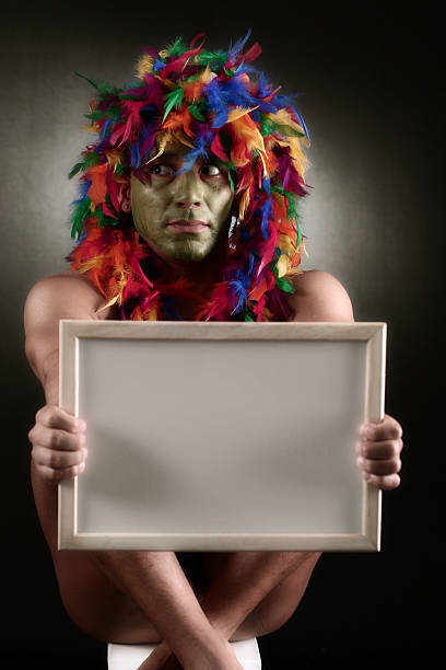 Shamanic Message shaman with sign board for all your shamanic messaging needs shaman humor individuality men stock pictures, royalty-free photos & images