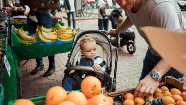 istock Father and Son Shopping Together 1159618222