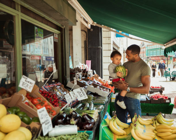 istock Shopping at a Produce Stand 1159618290