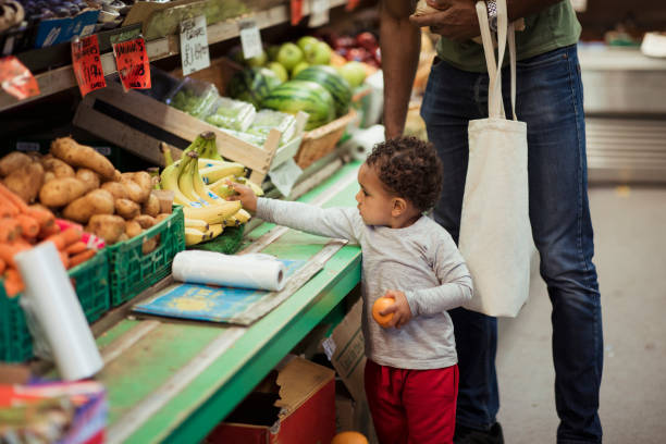 istock Father and Son Shopping Together 1159618565