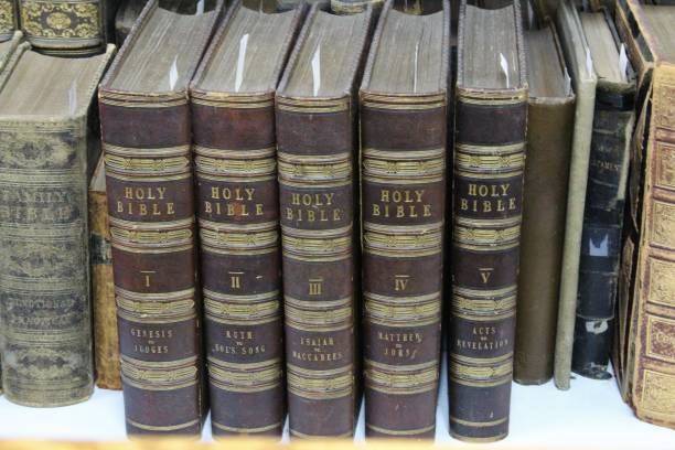 istock Old Bible Books on a bookshelf from the 1800s 1159621404