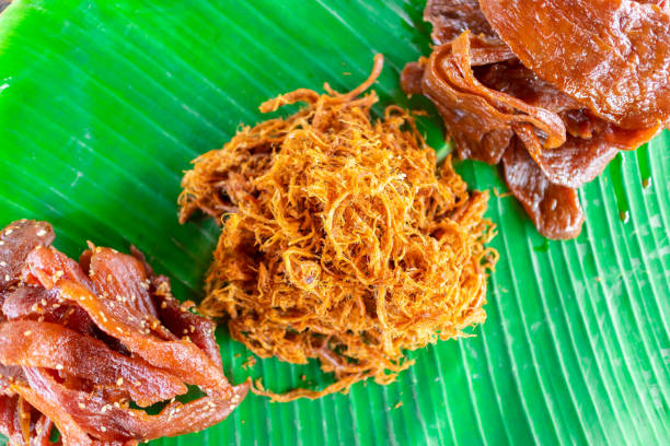 istock Thai food, Fried dried shredded pork on banana leaf. 1159621664