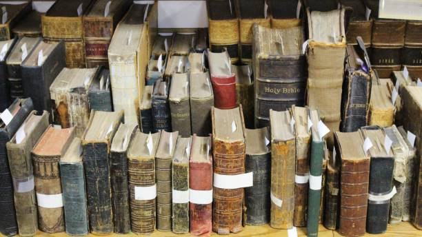 istock Old Bible Books on a bookshelf from the 1800s 1159621852