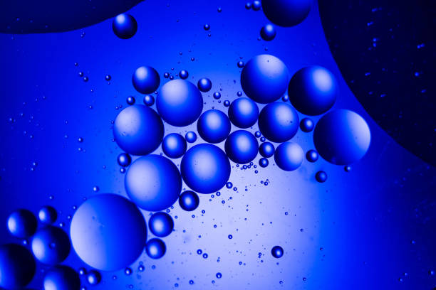istock abstract color oil patterns. scientific research experiment in laboratory Petri dish. 1159623214