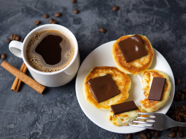 istock A Cup of fragrant espresso coffee and cheesecakes with chocolate and cinnamon 1159624555