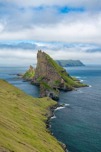 istock Drangarnir, Tindholmur and Mykines islands 1159625779