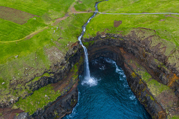 istock Mulafossur waterfall aerial drone view in Gasadalur, Vagar 1159625829