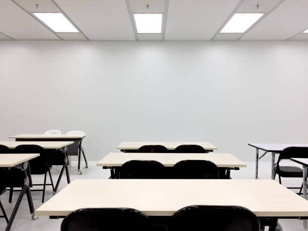 istock Empty clean room with chairs and tables for training,meeting 1159627083